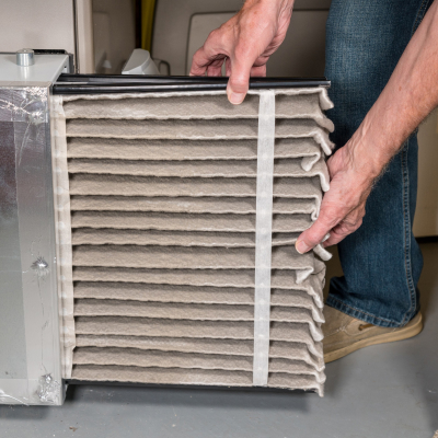 dirty air filter being removed